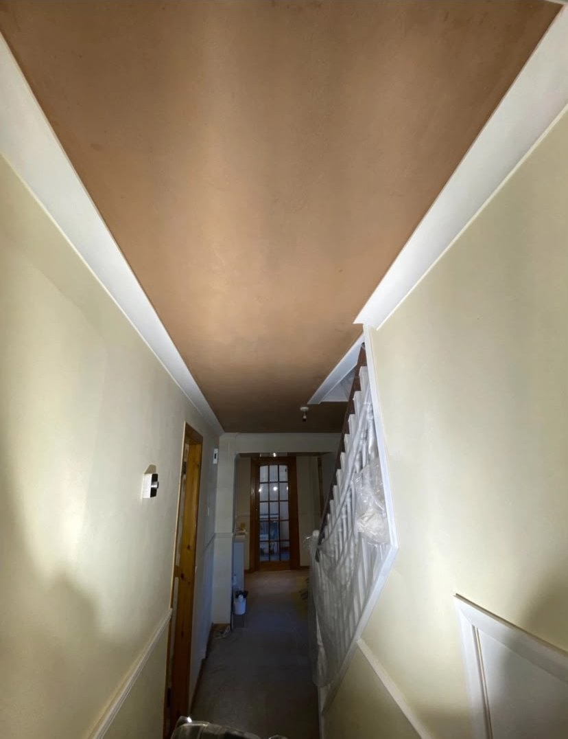 Fresh plaster ceiling in a hallway