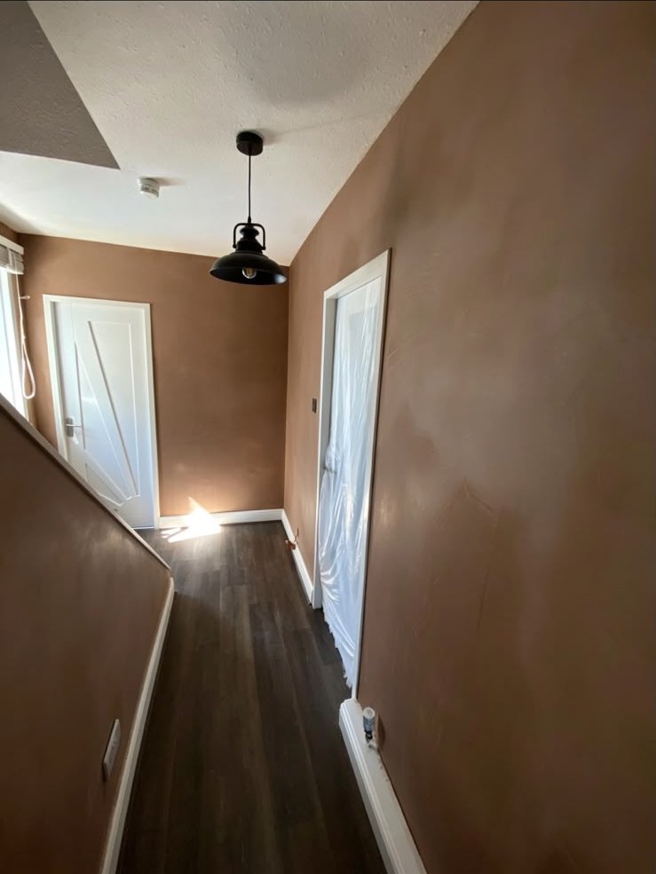 Landing walls freshly skimmed