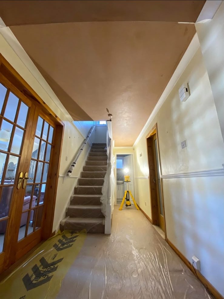Hallway and stairs replastered