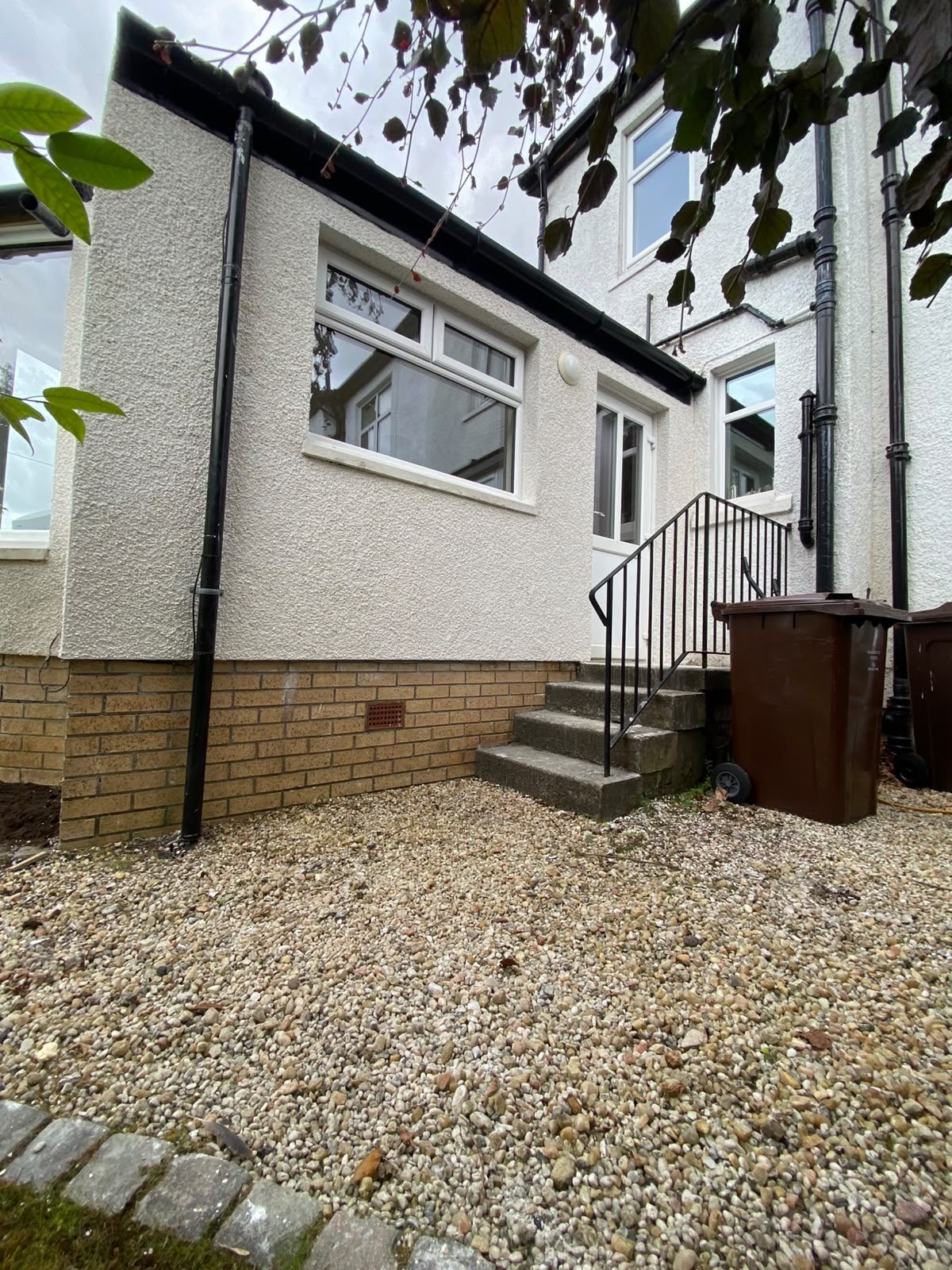 Rear extension finished in smooth white render