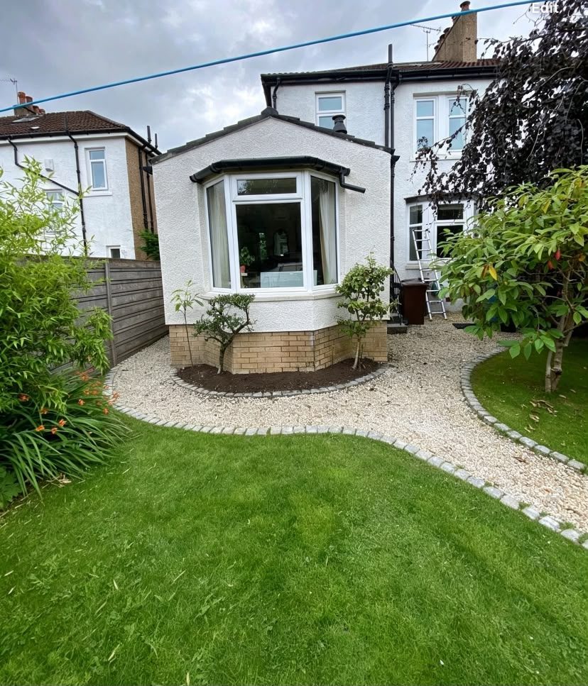 Rendered rear extension with bay window and new garden